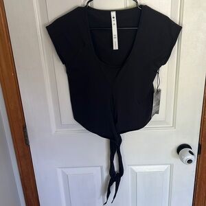 Size 8 black Stori wrap tie fitness top